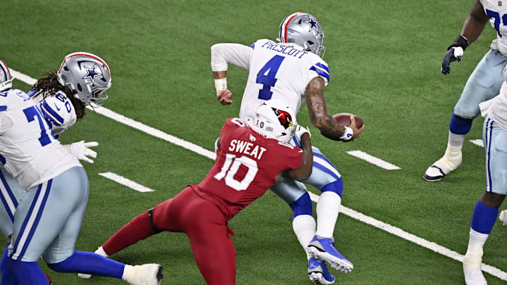 Arizona Cardinals linebacker Josh Sweat sacks Dallas Cowboys quarterback Dak Prescott in the first half at AT&T Stadium. 