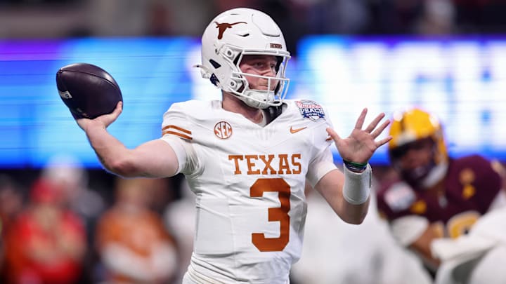 Jan 1, 2025; Atlanta, GA, USA; Texas Longhorns quarterback Quinn Ewers (3) passes the ball against the Arizona State Sun Devils during the first half of the Peach Bowl at Mercedes-Benz Stadium. Mandatory Credit: Brett Davis-Imagn Images