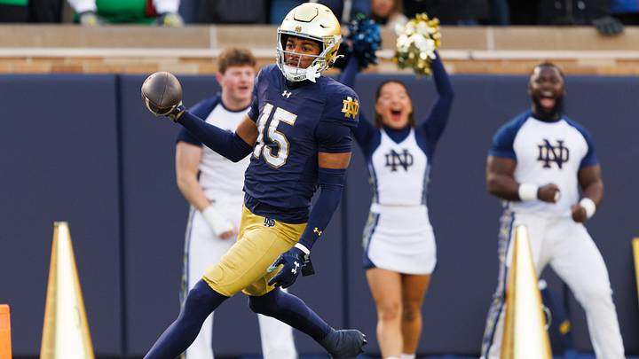 Notre Dame cornerback Leonard Moore returns an interception for a touchdown in the first half of a NCAA football game against Syracuse at Notre Dame Stadium on Saturday, Nov. 22, 2025, in South Bend. Notre Dame cornerback Leonard Moore returns an interception for a touchdown in the first half of a NCAA football game against Syracuse at Notre Dame Stadium on Saturday, Nov. 22, 2025, in South Bend.