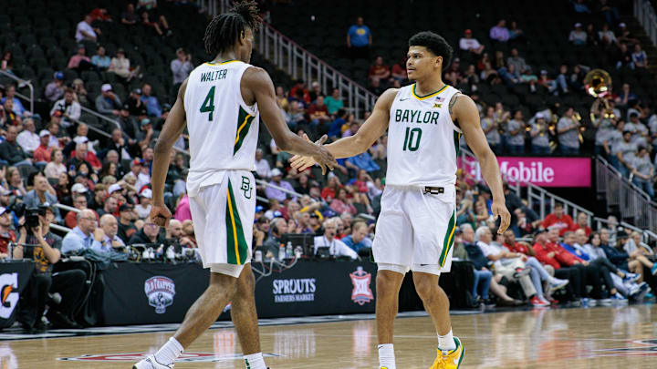 Mar 14, 2024; Kansas City, MO, USA; Baylor Bears guard RayJ Dennis (10) and Baylor Bears guard