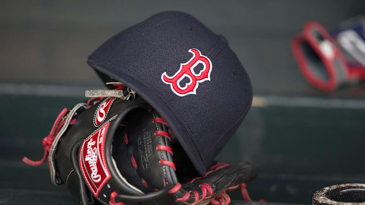 May 14, 2014; Minneapolis, MN, USA; A general view of a glove and Boston Red Sox hat in the dugout prior to a game between the Boston Red Sox and Minnesota Twins at Target Field. Mandatory Credit: Jesse Johnson-Imagn Images May 14, 2014; Minneapolis, MN, USA; A general view of a glove and Boston Red Sox hat in the dugout prior to a game between the Boston Red Sox and Minnesota Twins at Target Field. Mandatory Credit: Jesse Johnson-Imagn Images