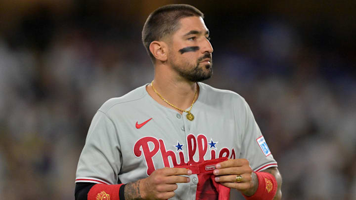 Sep 17, 2025; Los Angeles, California, USA;   Philadelphia Phillies right fielder Nick Castellanos (8) returns to the dugout after an out against the Los Angeles Dodgers at Dodger Stadium. Mandatory Credit: Jayne Kamin-Oncea-Imagn Images