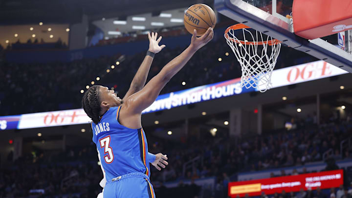 Mar 19, 2025; Oklahoma City, Oklahoma, USA; Oklahoma City Thunder forward Dillon Jones (3) shoots against the Philadelphia 76ers during the second half at Paycom Center. Mandatory Credit: Alonzo Adams-Imagn Images