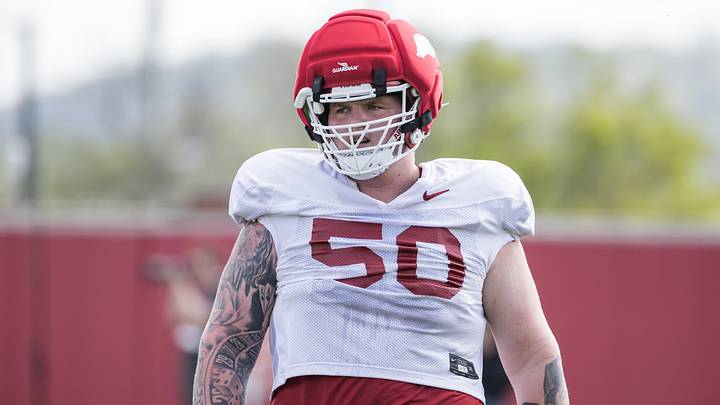 Arkansas Razorbacks offensive lineman Kobe Branham (50) gets back in line for the next drill during spring practice at the Arkansas Razorbacks practice facilities. Arkansas Razorbacks offensive lineman Kobe Branham (50) gets back in line for the next drill during spring practice at the Arkansas Razorbacks practice facilities.