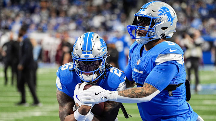 Detroit Lions running back Jahmyr Gibbs (26) warms up with running back David Montgomery (5). Detroit Lions running back Jahmyr Gibbs (26) warms up with running back David Montgomery (5).