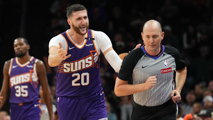 Nov 6, 2024; Phoenix, Arizona, USA; Phoenix Suns center Jusuf Nurkic (20) argues a call with a referee during the second half against the Miami Heat at Footprint Center. Mandatory Credit: Joe Camporeale-Imagn Images