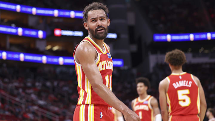 Oct 6, 2025; Houston, Texas, USA; Atlanta Hawks guard Trae Young (11) reacts towards a fan during the second quarter against the Houston Rockets at Toyota Center. Mandatory Credit: Troy Taormina-Imagn Images