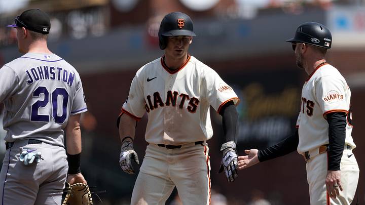 Giants outfielder Turner Hill, on base against the Rockies | Credit: D. Ross Cameron Giants outfielder Turner Hill, on base against the Rockies | Credit: D. Ross Cameron