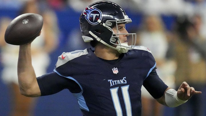 Dec 22, 2024; Indianapolis, Indiana, USA; Tennessee Titans quarterback Mason Rudolph (11) draws back to pass during a game against the Indianapolis Colts at Lucas Oil Stadium at Lucas Oil Stadium. Mandatory Credit: Christine Tannous/USA Today Network via Imagn Images 