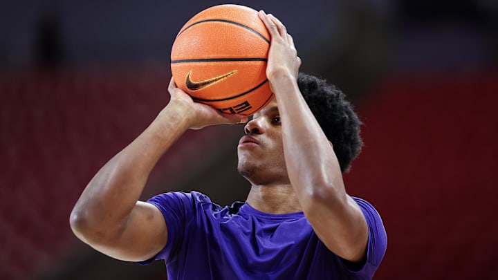 Feb 14, 2026; Houston, Texas, USA;  Kansas State Wildcats forward Taj Manning (15) warms up before playing against the Houston Cougars at Fertitta Center.