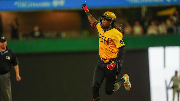 Pittsburgh Pirates shortstop Oneil Cruz (15) reacts to hitting a two-run home run as he rounds the bases against the Colorado Rockies during the ninth inning at PNC Park. 