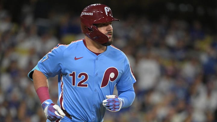 Oct 8, 2025; Los Angeles, California, USA; Philadelphia Phillies designated hitter Kyle Schwarber (12) rounds the bases hitting a solo home run off Los Angeles Dodgers pitcher Yoshinobu Yamamoto (18) during the fourth inning of game three of the NLDS during the 2025 MLB playoffs at Dodger Stadium. Mandatory Credit: Jayne Kamin-Oncea-Imagn Images