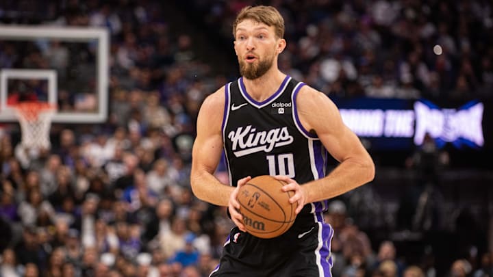 Feb 22, 2024; Sacramento, California, USA; Sacramento Kings forward Domantas Sabonis (10) controls the ball during the second quarter at Golden 1 Center. Mandatory Credit: Ed Szczepanski-Imagn Images