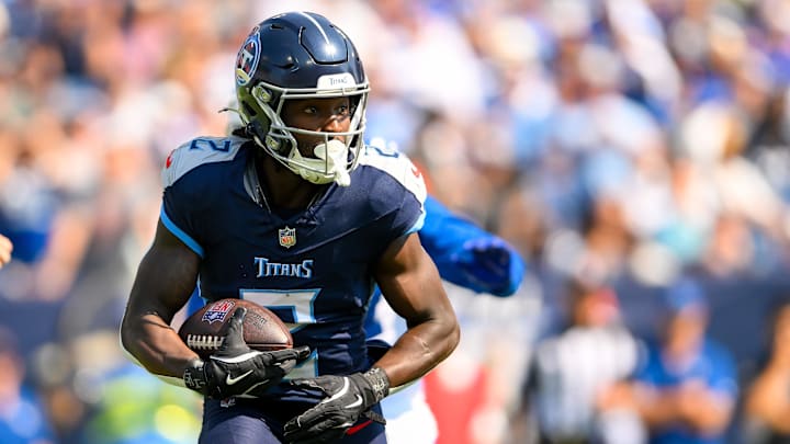 Oct 13, 2024; Nashville, Tennessee, USA;  Tennessee Titans running back Tyjae Spears (2) runs the ball against the Indianapolis Colts during the first half at Nissan Stadium. Mandatory Credit: Steve Roberts-Imagn Images