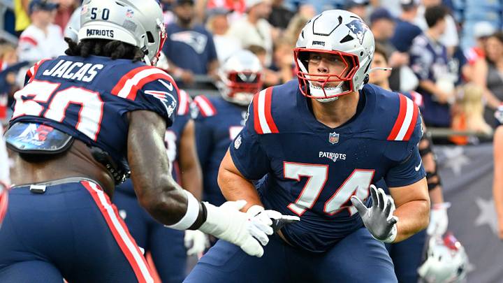 Aug 13, 2026; Foxborough, Massachusetts, USA; New England Patriots offensive tackle Caleb Lomu (74) warms up with linebacker Gabe Jacas (50) before a game against the Indianapolis Colts at Gillette Stadium. Mandatory Credit: Eric Canha-Imagn Images Aug 13, 2026; Foxborough, Massachusetts, USA; New England Patriots offensive tackle Caleb Lomu (74) warms up with linebacker Gabe Jacas (50) before a game against the Indianapolis Colts at Gillette Stadium. Mandatory Credit: Eric Canha-Imagn Images