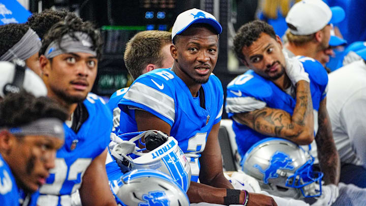 Detroit Lions quarterback Hendon Hooker talks to other players on the bench during the first quarter of the preseason game at Ford Field in Detroit, Saturday, Aug. 16, 2025.