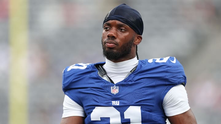 Aug 16, 2025; East Rutherford, New Jersey, USA; New York Giants cornerback Paulson Adebo (21) looks on ptpg against the New York Jets at MetLife Stadium. Aug 16, 2025; East Rutherford, New Jersey, USA; New York Giants cornerback Paulson Adebo (21) looks on ptpg against the New York Jets at MetLife Stadium.