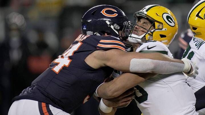 Green Bay Packers quarterback Jordan Love suffers a concussion after being hit by Austin Booker last season.