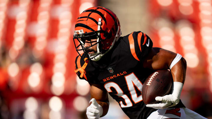 Cincinnati Bengals running back Jacob Saylors (34) runs with the ball before the NFL preseason week 3 game between the Cincinnati Bengals and the Washington Commanders at FedEx Field in Landover, M.D., on Saturday, Aug. 26, 2023.