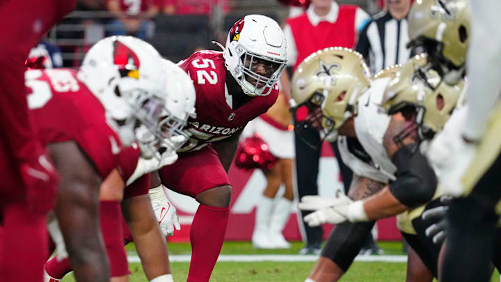 Cardinals linebacker Victor Dimukeje (52) looks to blitz against the Saints during a game at State Farm Stadium in Glendale, Ariz., on Saturday, Aug. 10, 2024.