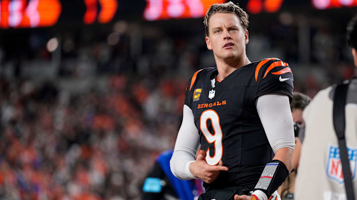Cincinnati Bengals quarterback Joe Burrow (9) celebrates after the game-winning touchdown pass to Tee Higgins in overtime of the NFL Week 17 game between the Cincinnati Bengals and the Denver Broncos at Paycor Stadium in downtown Cincinnati on Saturday, Dec. 28, 2024. The Bengals took a 30-24 win in overtime to remain in the post season chase. Cincinnati Bengals quarterback Joe Burrow (9) celebrates after the game-winning touchdown pass to Tee Higgins in overtime of the NFL Week 17 game between the Cincinnati Bengals and the Denver Broncos at Paycor Stadium in downtown Cincinnati on Saturday, Dec. 28, 2024. The Bengals took a 30-24 win in overtime to remain in the post season chase.