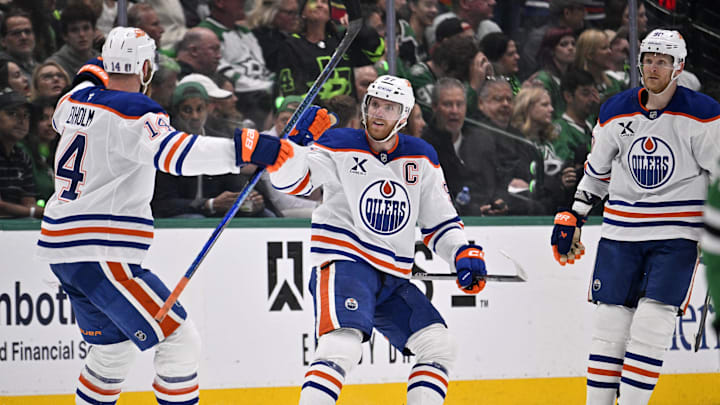 May 29, 2025; Dallas, Texas, USA; Edmonton Oilers center Connor McDavid (97) reacts after scoring a goal against the Dallas Stars during the second period in game five of the Western Conference Final of the 2025 Stanley Cup Playoffs at American Airlines Center. Mandatory Credit: Jerome Miron-Imagn Images