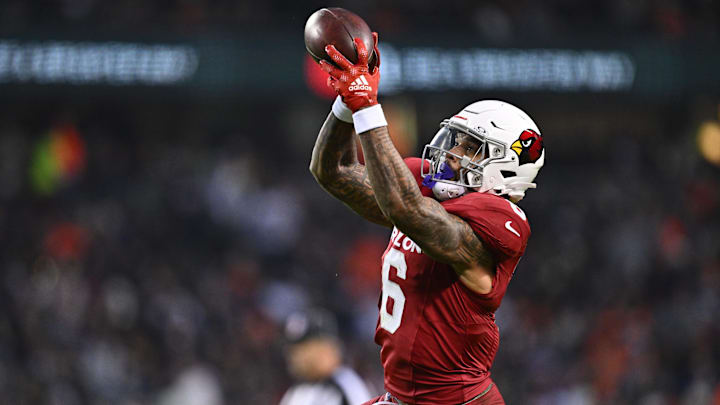 Dec 24, 2023; Chicago, Illinois, USA;  Arizona Cardinals running back James Conner (6) catches a pass that he converts into a touchdown in the first half against the Chicago Bears at Soldier Field. Mandatory Credit: Jamie Sabau-USA TODAY Sports