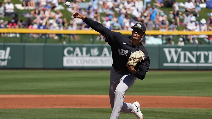 Mar 23, 2026; Mesa, Arizona, USA; New York Yankees pitcher Carlos Lagrange (84) throws against the Chicago Cubs in the first inning at Sloan Park. Mandatory Credit: Rick Scuteri-Imagn Images