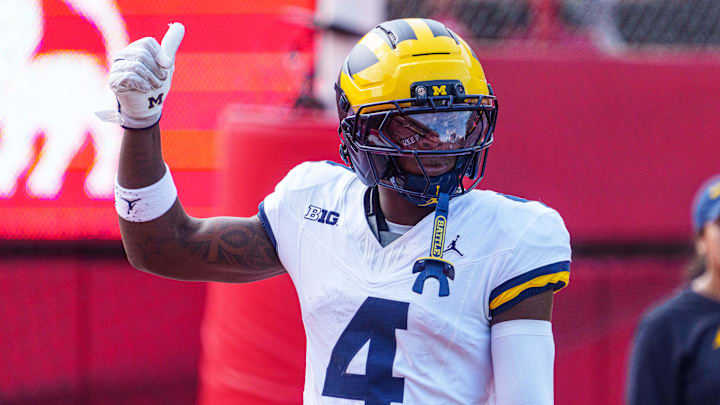 Michigan Wolverines wide receiver Andrew Marsh warms up before the game against the Nebraska Cornhuskers at Memorial Stadium. Michigan Wolverines wide receiver Andrew Marsh warms up before the game against the Nebraska Cornhuskers at Memorial Stadium.