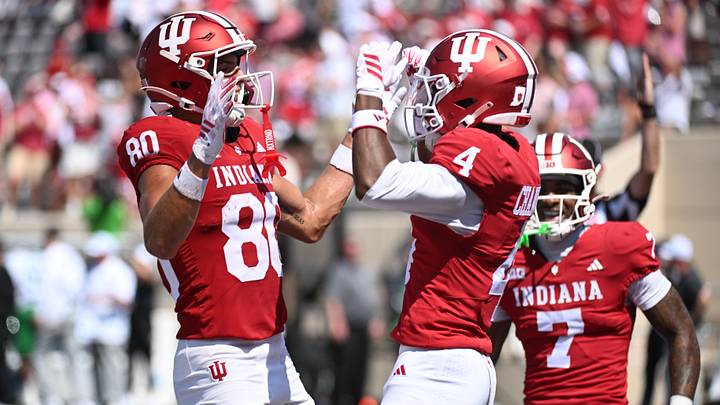 Sep 5, 2026; Bloomington, Indiana, USA;  Indiana Hoosiers wide receiver Davion Chandler (4) celebrates  with wide receiver Charlie Becker (80) after scoring a touchdown against the North Texas Mean Green during the fourth quarter at Merchants Bank Field at Memorial Stadium.  Mandatory Credit: Robert Goddin-Imagn Images