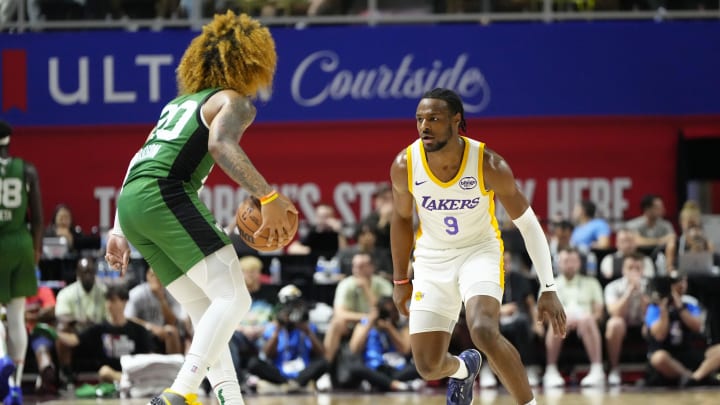 Jul 15, 2024; Las Vegas, NV, USA; Los Angeles Lakers guard Bronny James (9) defends against Boston Celtics guard JD Davison (20) during the first half at Thomas & Mack Center. Mandatory Credit: Lucas Peltier-USA TODAY Sports Jul 15, 2024; Las Vegas, NV, USA; Los Angeles Lakers guard Bronny James (9) defends against Boston Celtics guard JD Davison (20) during the first half at Thomas & Mack Center. Mandatory Credit: Lucas Peltier-USA TODAY Sports