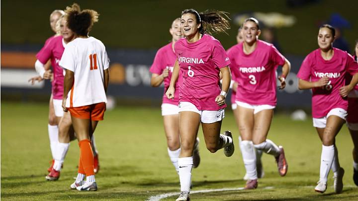 Ella Carter and Sophia Bradley rush to celebrate with Addison Halpern after Halpern's game-tying goal vs Clemson. Ella Carter and Sophia Bradley rush to celebrate with Addison Halpern after Halpern's game-tying goal vs Clemson.
