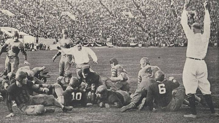 Pooley Hubert scores Alabama's first touchdown to begin the Crimson Tide's comeback against Washington in the 1926 Rose Bowl.