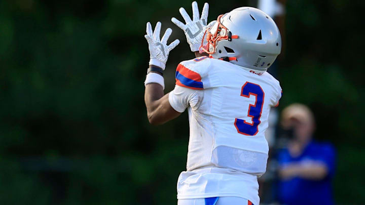 Bolles' Naeem Burroughs (3) hauls in a reception for a touchdown score during the second quarter of a high school football matchup Thursday, May 23, 2024 at Mandarin High School in Jacksonville, Fla. Mandarin defeated Bolles 35-14.