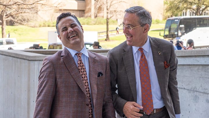 Sean Miller chats with athletic director Chris Del Conte following a press conference announcing Miller as The University of Texas' new men's basketball coach Tuesday, March 25, 2025. Sean Miller chats with athletic director Chris Del Conte following a press conference announcing Miller as The University of Texas' new men's basketball coach Tuesday, March 25, 2025.