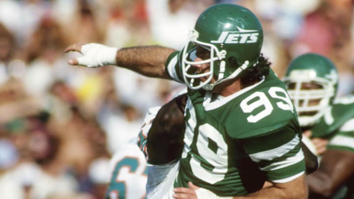 Dec 18, 1982; Miami, FL, USA; FILE PHOTO; New York Jets defensive end Mark Gastineau (99) in action against the Miami Dolphins at the Orange Bowl. 