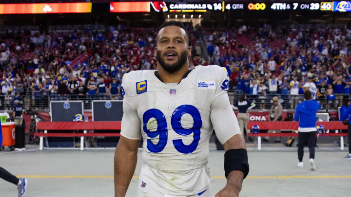 Nov 26, 2023; Glendale, Arizona, USA; Los Angeles Rams defensive tackle Aaron Donald (99) against the Arizona Cardinals at State Farm Stadium. Mandatory Credit: Mark J. Rebilas-USA TODAY Sports Nov 26, 2023; Glendale, Arizona, USA; Los Angeles Rams defensive tackle Aaron Donald (99) against the Arizona Cardinals at State Farm Stadium. Mandatory Credit: Mark J. Rebilas-USA TODAY Sports