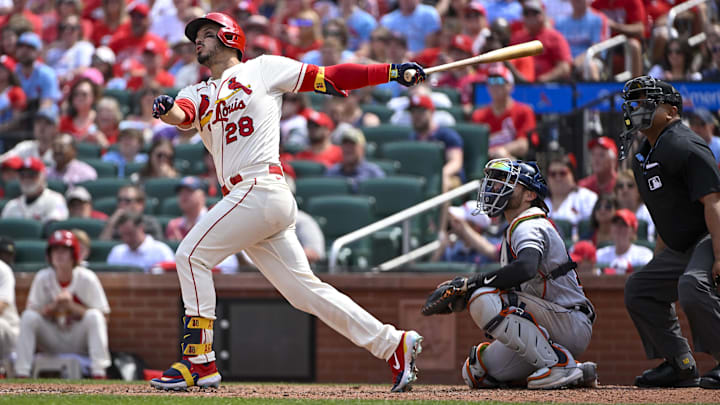May 6, 2023; St. Louis, Missouri, USA;  St. Louis Cardinals third baseman Nolan Arenado (28) hits a two run home run against the Detroit Tigers during the fifth inning at Busch Stadium.