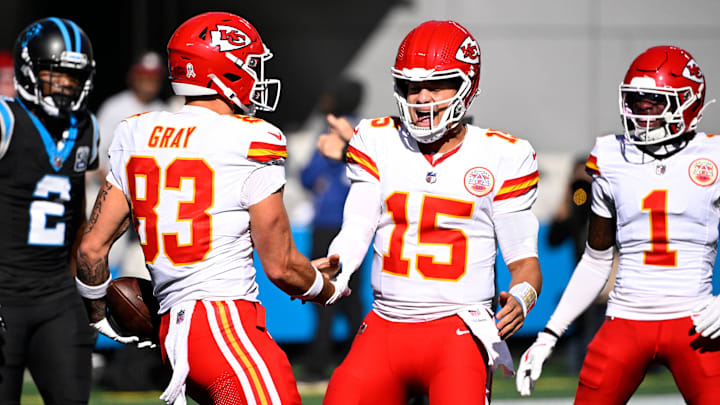 Nov 24, 2024; Charlotte, North Carolina, USA; Kansas City Chiefs tight end Noah Gray (83) celebrates with quarterback Patrick Mahomes (15) after scoring a touchdown in the first quarter at Bank of America Stadium. Mandatory Credit: Bob Donnan-Imagn Images