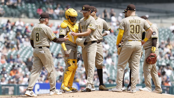 Apr 23, 2025; Detroit, Michigan, USA;  San Diego Padres manager Mike Shildt (8) take the ball to relieve starting pitcher Kyle Hart (68) in the fifth inning against the Detroit Tigers at Comerica Park. Mandatory Credit: Rick Osentoski-Imagn Images