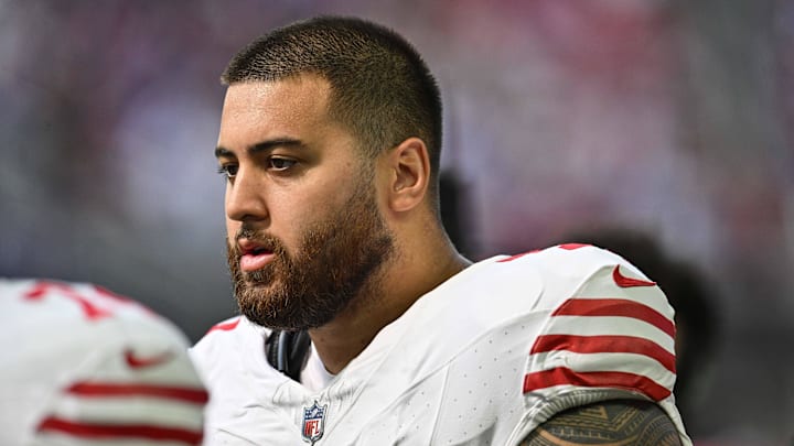 Sep 15, 2024; Minneapolis, Minnesota, USA; San Francisco 49ers guard Dominick Puni (77) looks on during the game against the Minnesota Vikings at U.S. Bank Stadium. Mandatory Credit: Jeffrey Becker-Imagn Images Sep 15, 2024; Minneapolis, Minnesota, USA; San Francisco 49ers guard Dominick Puni (77) looks on during the game against the Minnesota Vikings at U.S. Bank Stadium. Mandatory Credit: Jeffrey Becker-Imagn Images