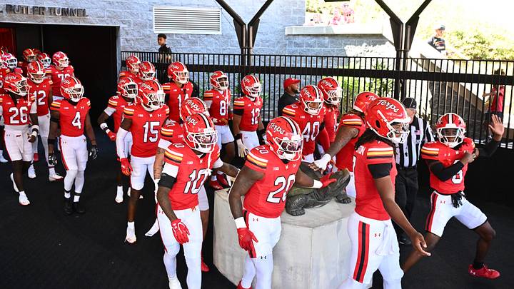 Sep 13, 2025; College Park, Maryland, USA; The Maryland Terrapins take the field for their game against the Towson Tigers at SECU Stadium.