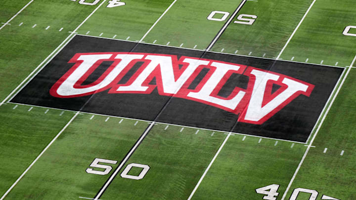 The UNLV Rebels logo at midfield during the Mountain West Championship at Allegiant Stadium. Mandatory Credit: Kirby Lee-Imagn Images