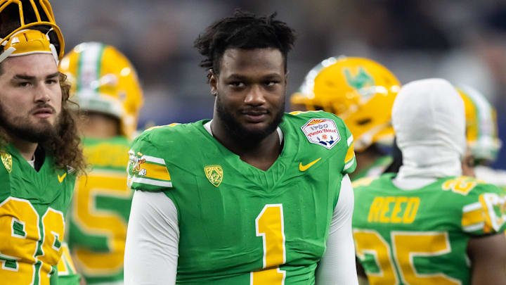 Jan 1, 2024; Glendale, AZ, USA; Oregon Ducks defensive end Jordan Burch (1) against the Liberty Flames during the 2024 Fiesta Bowl at State Farm Stadium. 