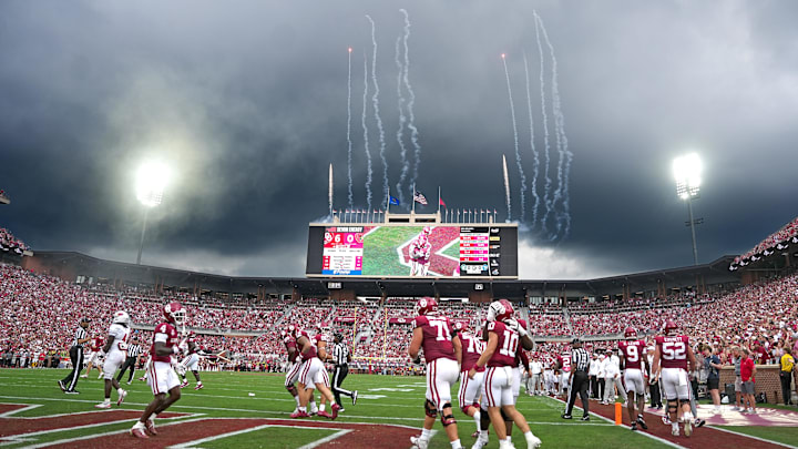 Oklahoma celebrates after quarterback John Mateer rushes for a touchdown against Illinois State. Oklahoma celebrates after quarterback John Mateer rushes for a touchdown against Illinois State.