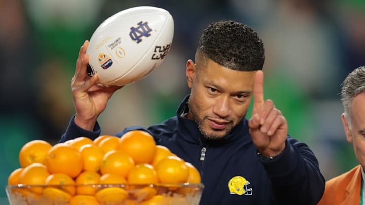 (EDITORS NOTE: caption correction) Jan 9, 2025; Miami, FL, USA; Notre Dame Fighting Irish head coach Marcus Freeman celebrates defeating the Penn State Nittany Lions  in the Orange Bowl at Hard Rock Stadium. 