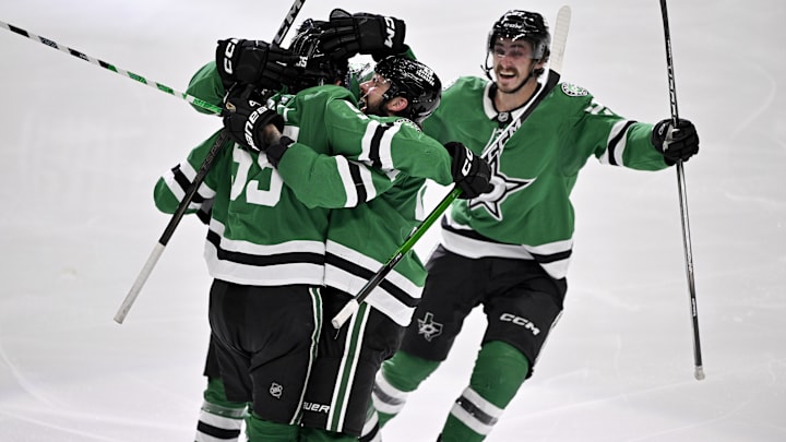 May 17, 2025; Dallas, Texas, USA; Dallas Stars defenseman Thomas Harley (55) and center Tyler Seguin (91) and left wing Mason Marchment (27) celebrates the game winning goal scored by Harley against the Winnipeg Jets during the overtime period in game six of the second round of the 2025 Stanley Cup Playoffs at American Airlines Center. Mandatory Credit: Jerome Miron-Imagn Images