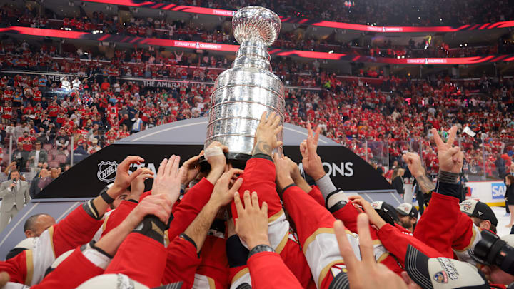 Jun 17, 2025; Sunrise, Florida, USA; The Florida Panthers hoist the Stanley Cup after winning game six of the 2025 Stanley Cup Final against the Edmonton Oilers at Amerant Bank Arena. Mandatory Credit: Sam Navarro-Imagn Images Jun 17, 2025; Sunrise, Florida, USA; The Florida Panthers hoist the Stanley Cup after winning game six of the 2025 Stanley Cup Final against the Edmonton Oilers at Amerant Bank Arena. Mandatory Credit: Sam Navarro-Imagn Images
