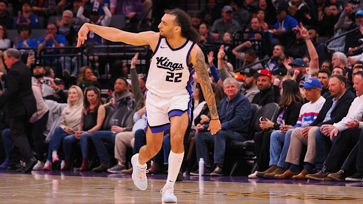 Mar 19, 2025; Sacramento, California, USA; Sacramento Kings guard Devin Carter (22) gestures after a three point basket against the Cleveland Cavaliers during the third quarter at Golden 1 Center. Mandatory Credit: Kelley L Cox-Imagn Images