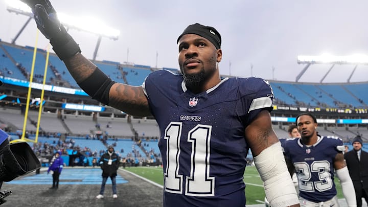 Dec 15, 2024; Charlotte, North Carolina, USA; Dallas Cowboys linebacker Micah Parsons (11) walks off the field after the game at Bank of America Stadium. Mandatory Credit: Bob Donnan-Imagn Images
